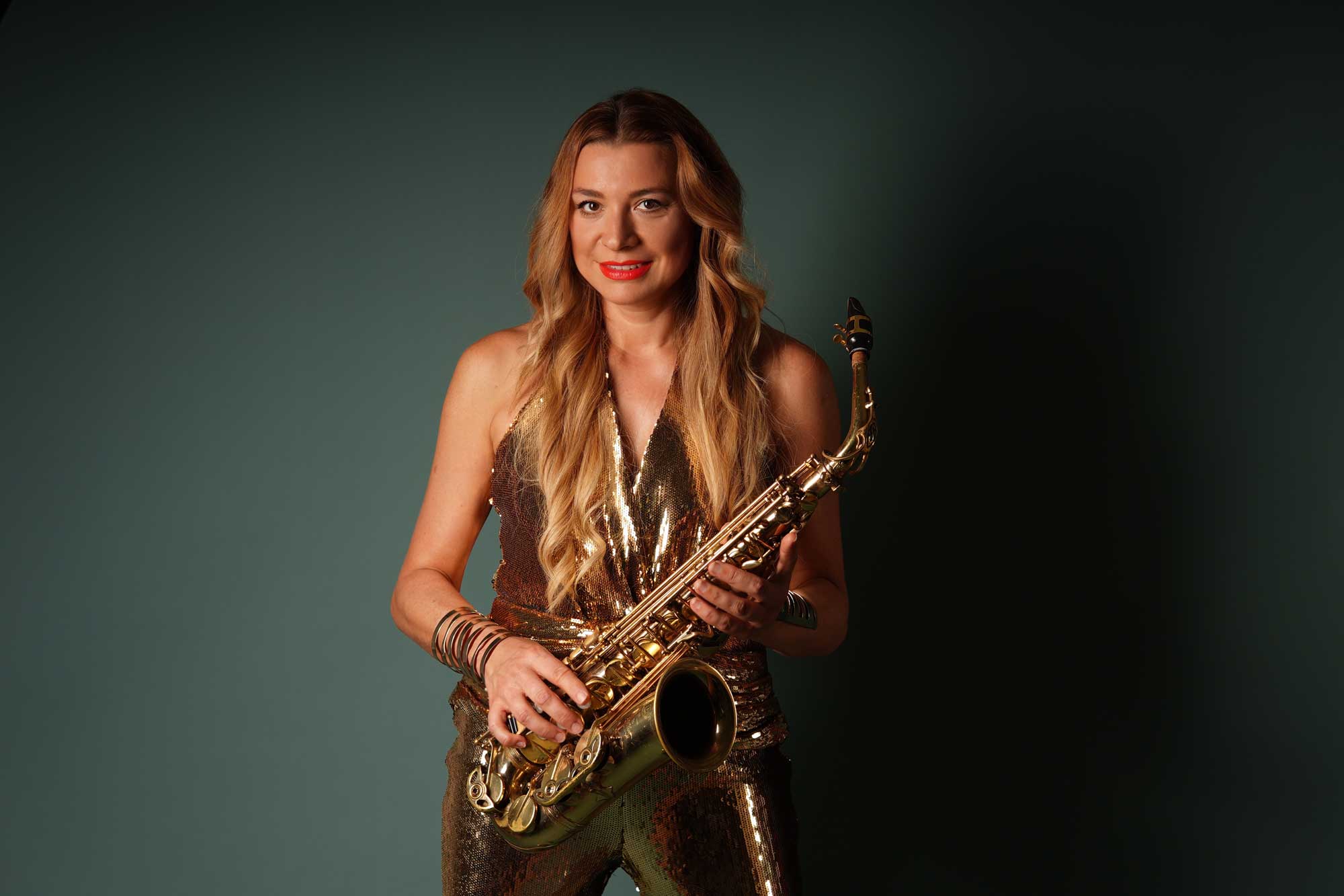 Saxophonist welcoming guests at BAU Munich 2027