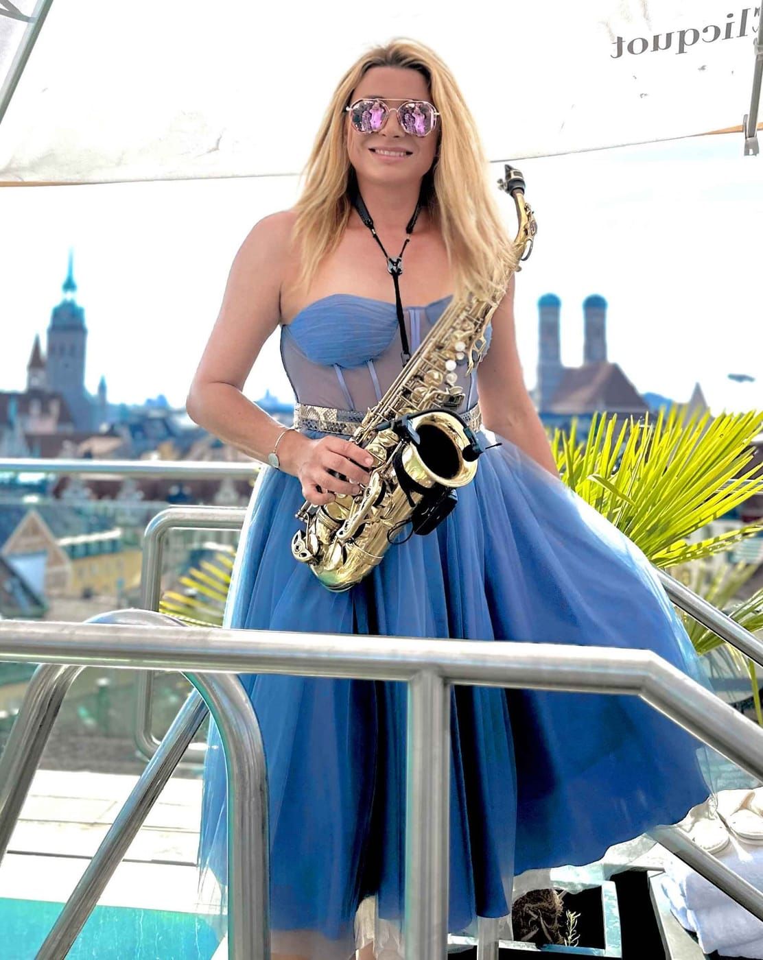 DJ and saxophonist summer party law firm Munich rooftop event