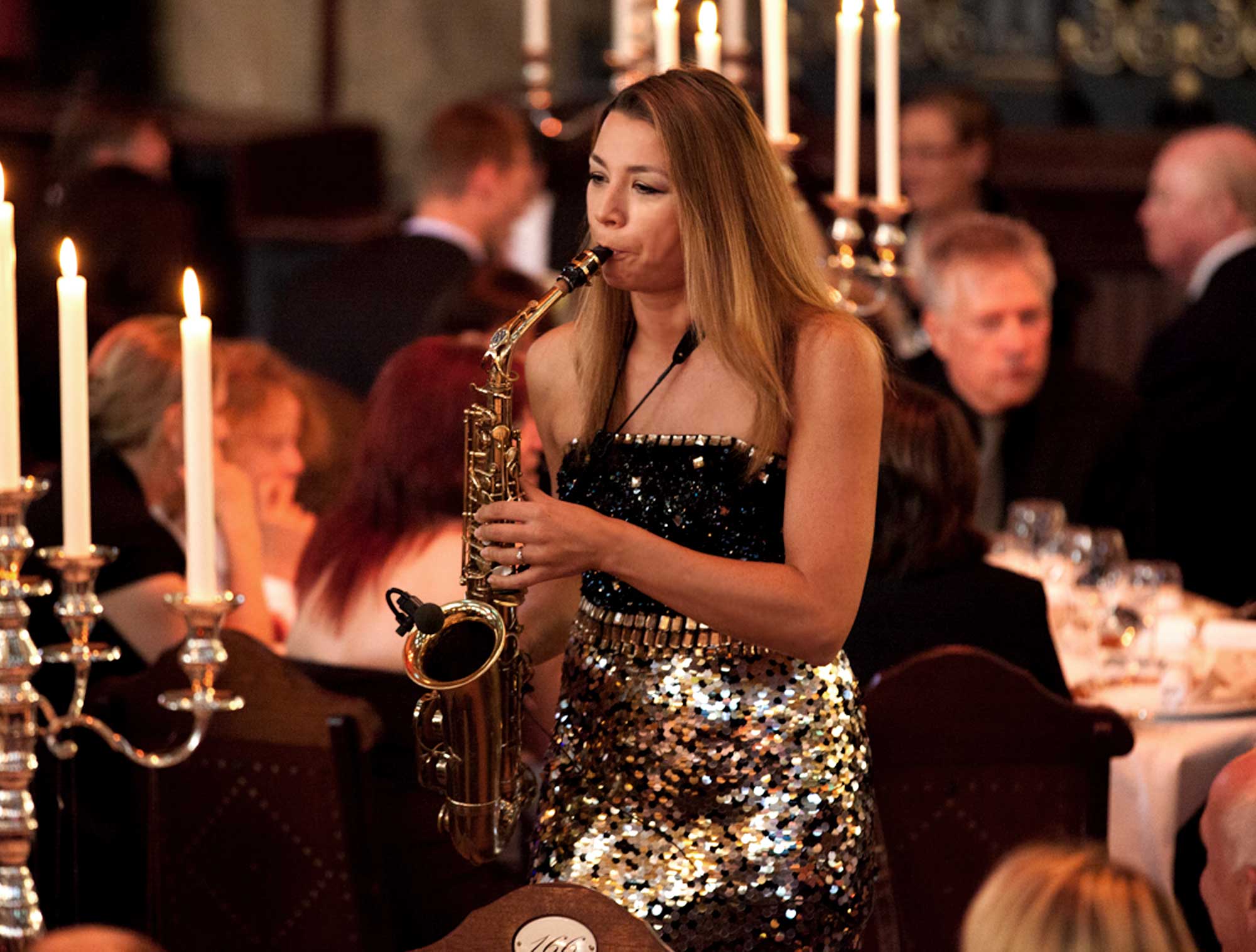 Saxophonist Natalie Marchenko at an exclusive gala event in Munich with live saxophone show