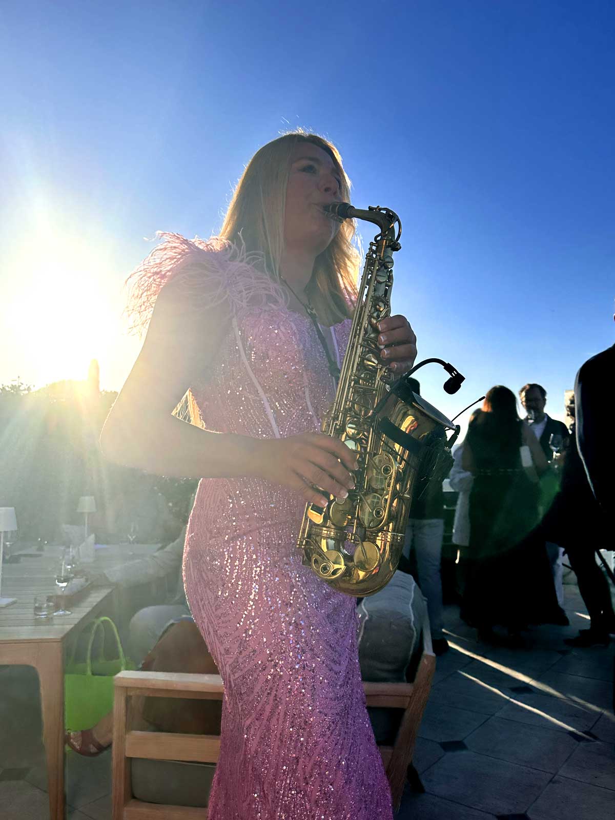 Saxophonist Natalie Marchenko at a luxury event at the Althoff Villa Belrose Saint-Tropez